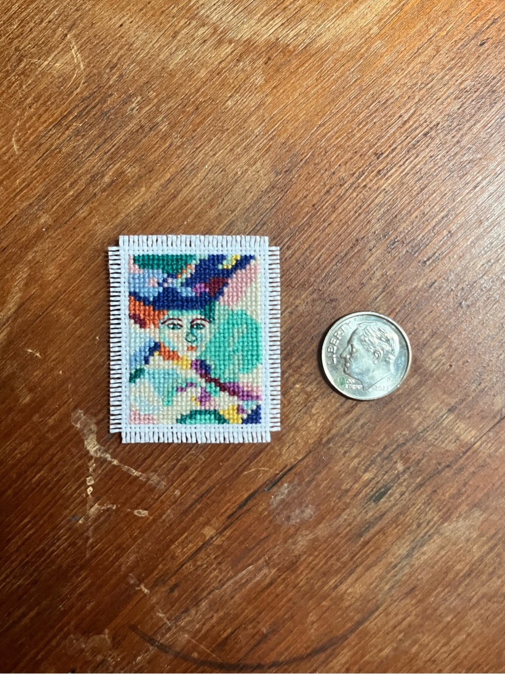 Henri Matisse’s “Woman with a Hat” in Mini Cross Stitch